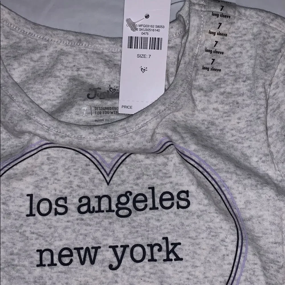 NWT Justice Graphic Long Sleeve T-Shirt. Size 7.